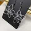گوشواره شفاف طرح گل مدل TH_96692